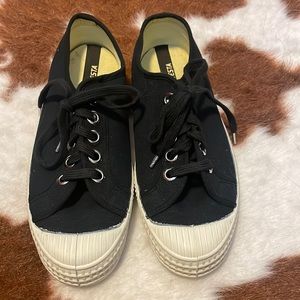 Novesta black sneakers.